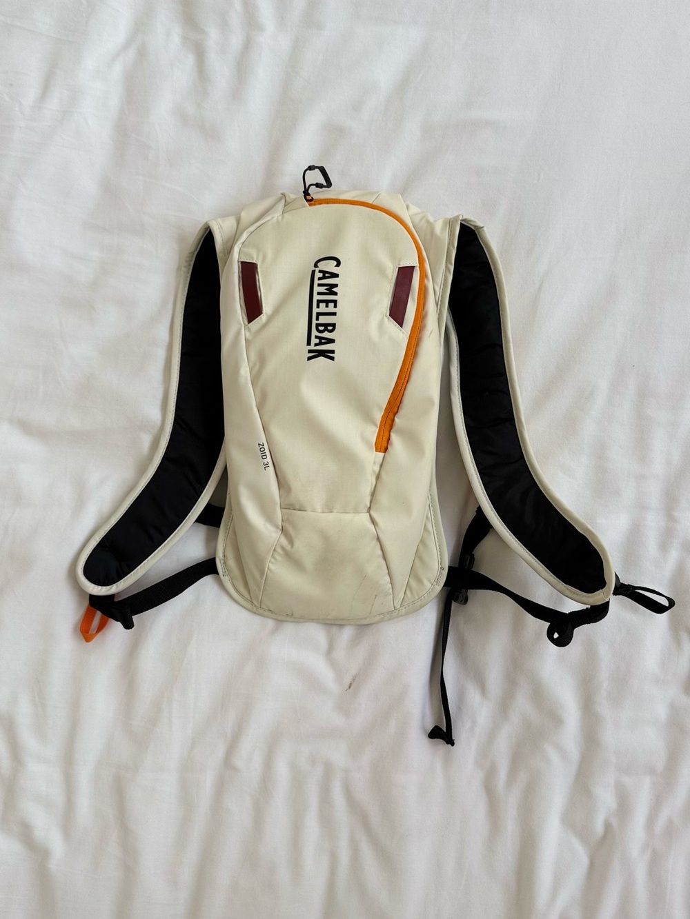 CamelBak Cream Hydration Backpack with Orange Detail